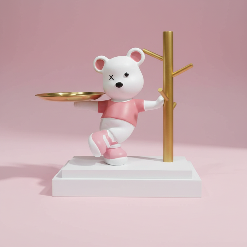 White bear figurine with pink shirt and shoes holding a gold tray on a pink background
