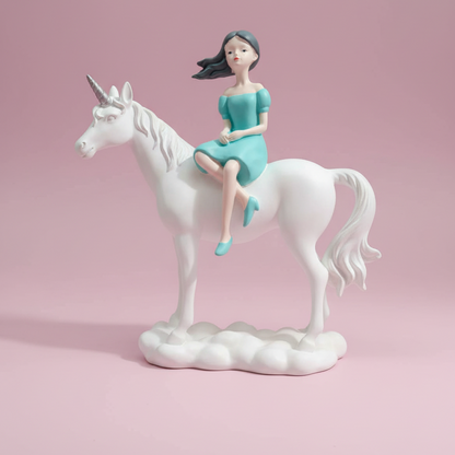 Figurine of a woman riding a unicorn on a pink background